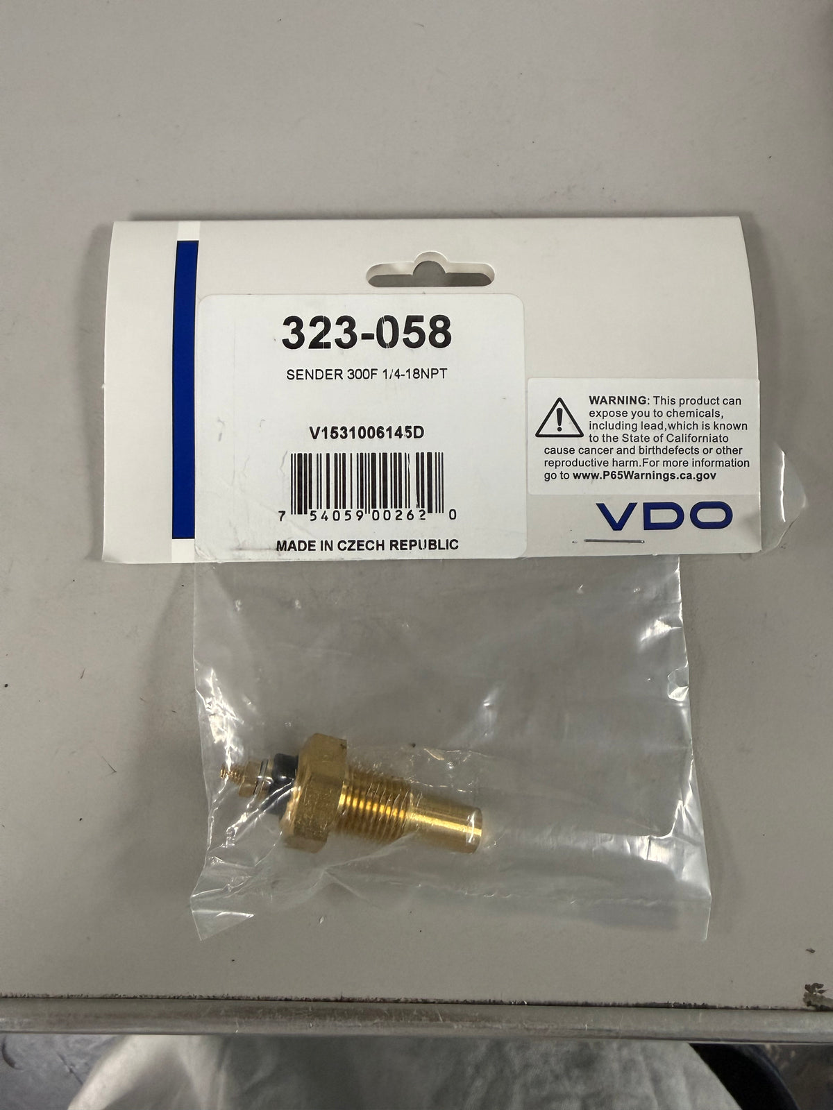 VDO 323-058 single-station fluid temperature sending unit used to measure engine oil or coolant temperatures.