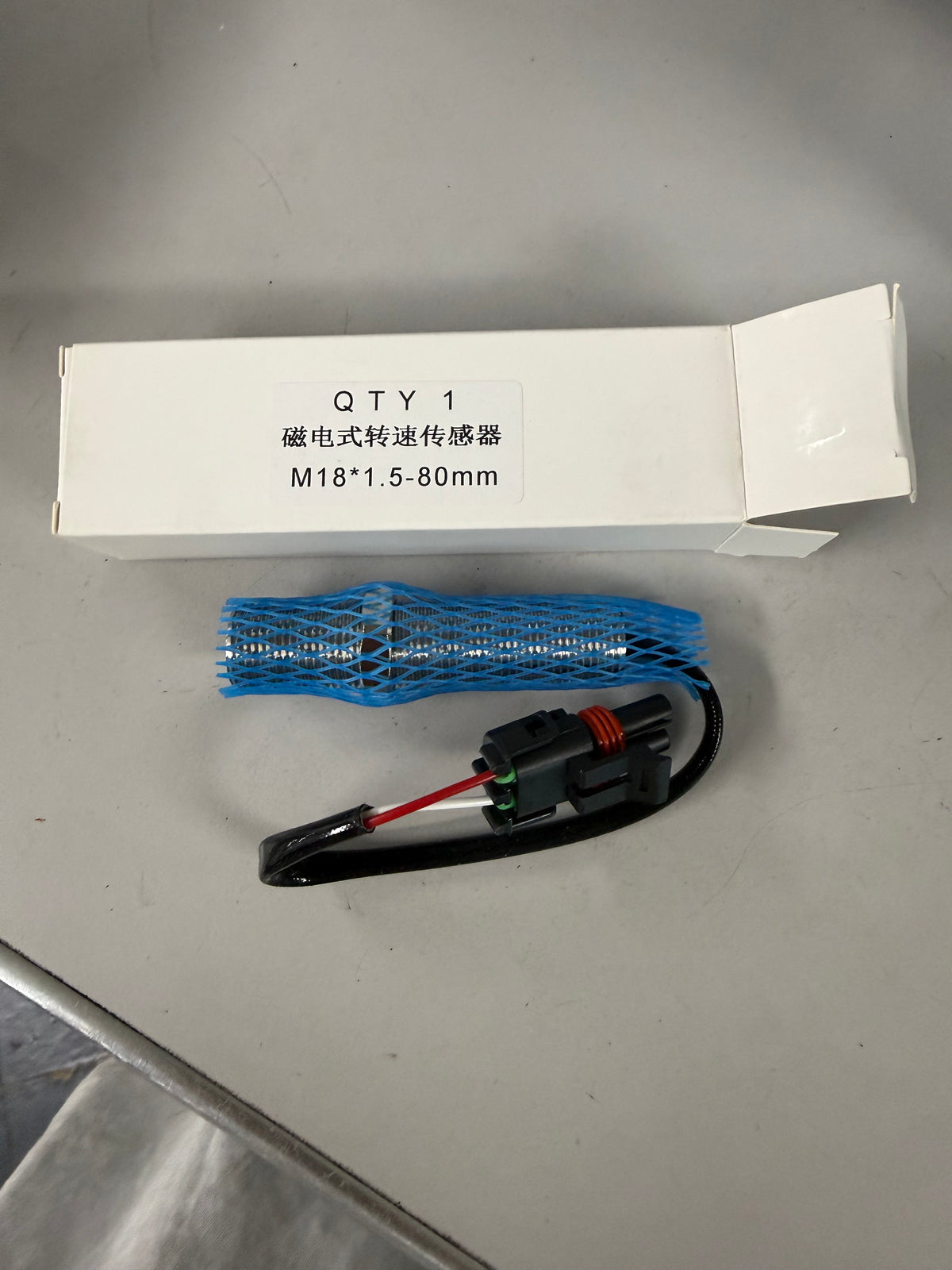 M18 magnetic pickup (such as part number 357-3053) electromagnetic speed sensor used to monitor rotational or vehicle speed in engines, generators, and heavy equipment