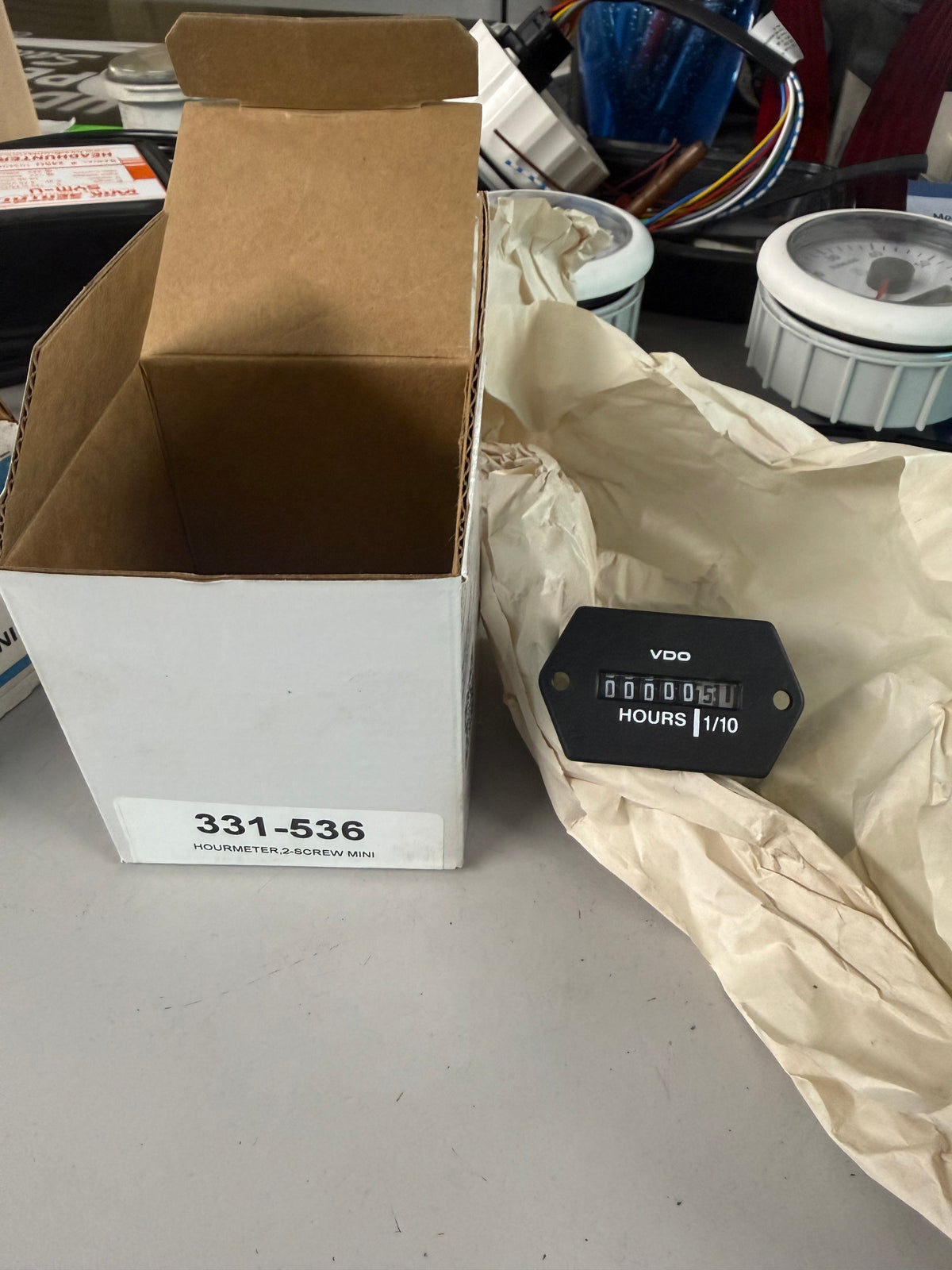 VDO 331-536 Mini Analog Hourmeter Gauge designed for space-constrained dashboards, heavy utility vehicles, marine panels, or industrial equipment