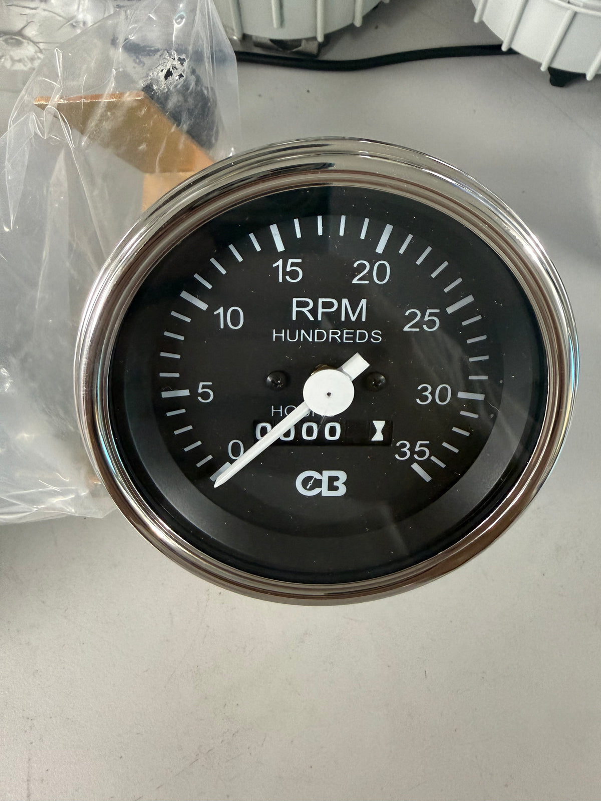 Clark Brothers Instrument Co. MTach 35RP heavy-duty, 12V DC microprocessor-controlled tachometer featuring a built-in digital totalizer (hour meter or odometer)